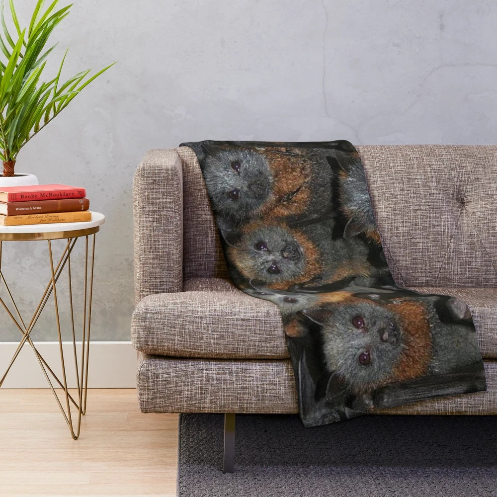 Soft plush blanket featuring adorable grey headed flying fox bats