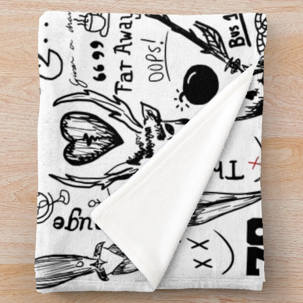 Plush blanket with tattoo-inspired one direction and 5 seconds of summer designs