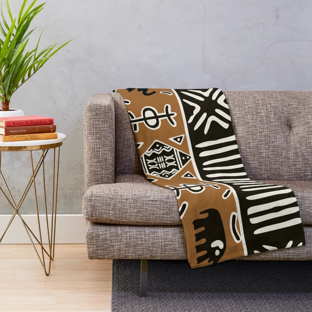 Soft plush blanket with tribal African mud cloth pattern and elephant design