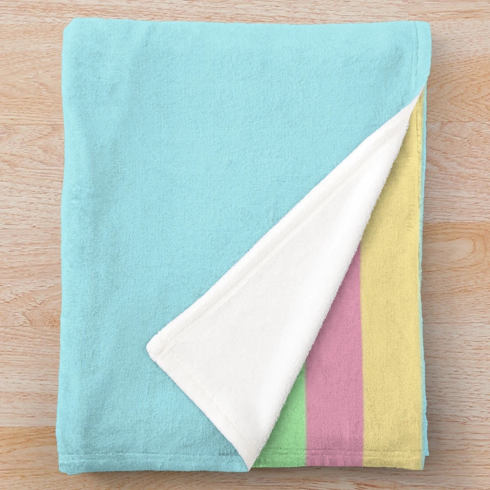 Soft red plush dog bed blanket with blue and pink accents