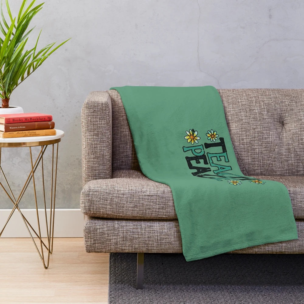 Soft, cozy plush blanket with "Teach Peace" design for teachers and students