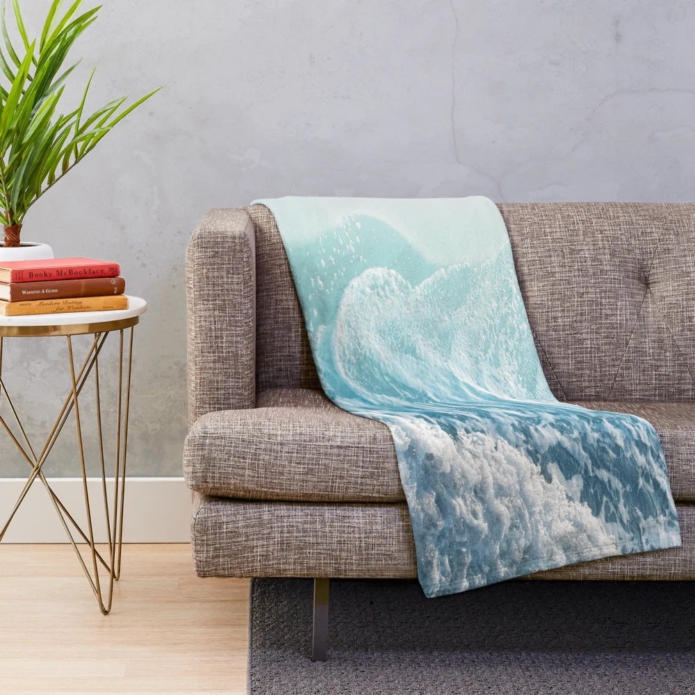 Soft plush turquoise ocean waves blanket for coastal home decor