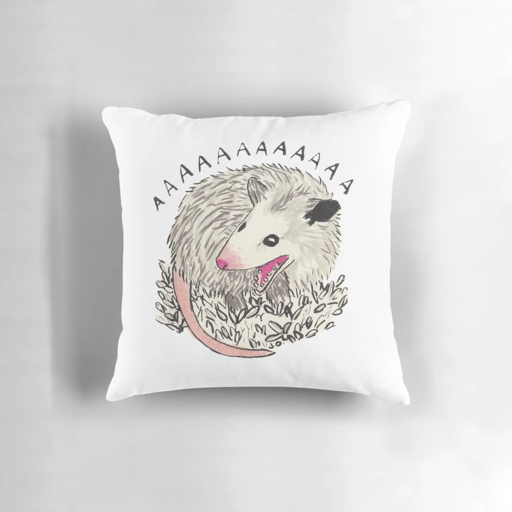 Soft, plush pillow featuring a screaming possum design for home decor and gifts