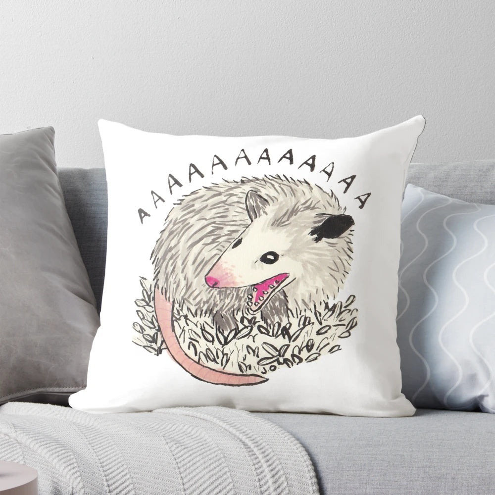 Soft, plush pillow featuring a screaming possum design for home decor and gifts