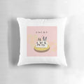 Soft and plush pillow featuring two adorable white and grey bunnies in a peaceful, snoozing pose