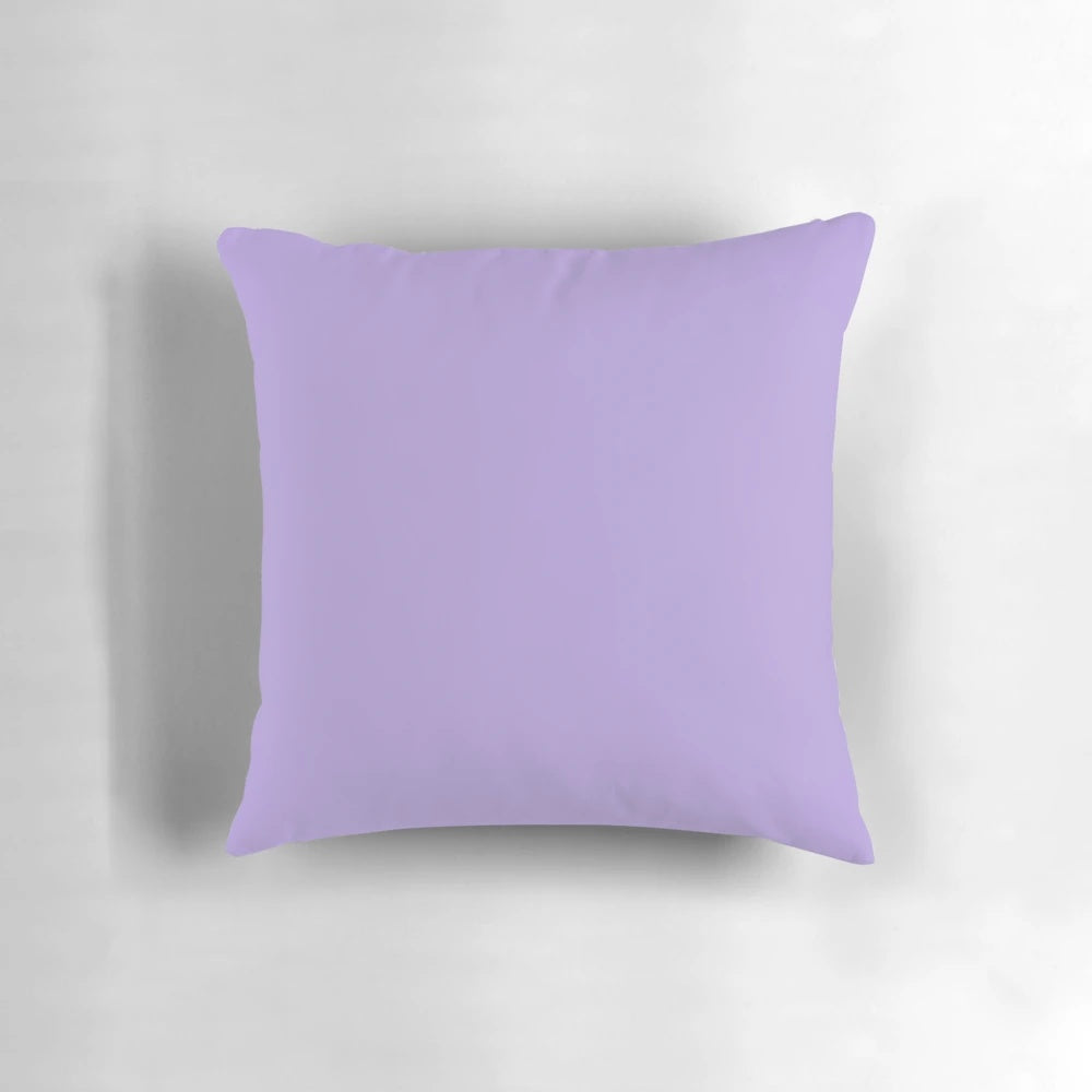 Light pastel purple and violet solid color pillow, perfect for a cozy and calming sleep environment.