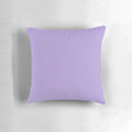 Light pastel purple and violet solid color pillow, perfect for a cozy and calming sleep environment.