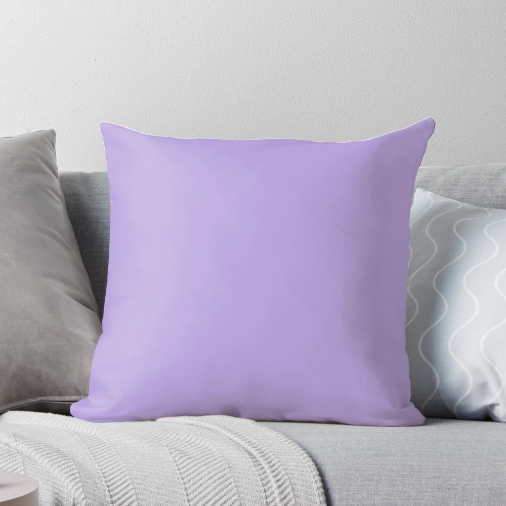 Light pastel purple and violet solid color pillow, perfect for a cozy and calming sleep environment.