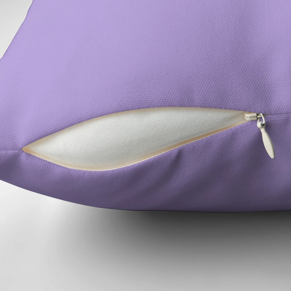Light pastel purple and violet solid color pillow, perfect for a cozy and calming sleep environment.