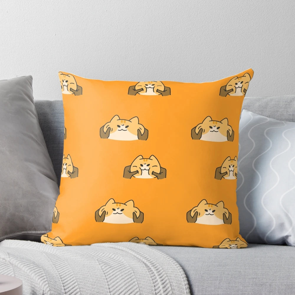 Soft, squishy orange kitten pillow with a cute, silly expression