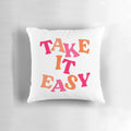 Soft and comfortable "Take It Easy" preppy-style pillow in a pink color