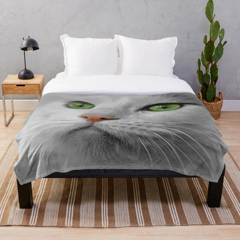 Soft white cat plush blanket with green eyes