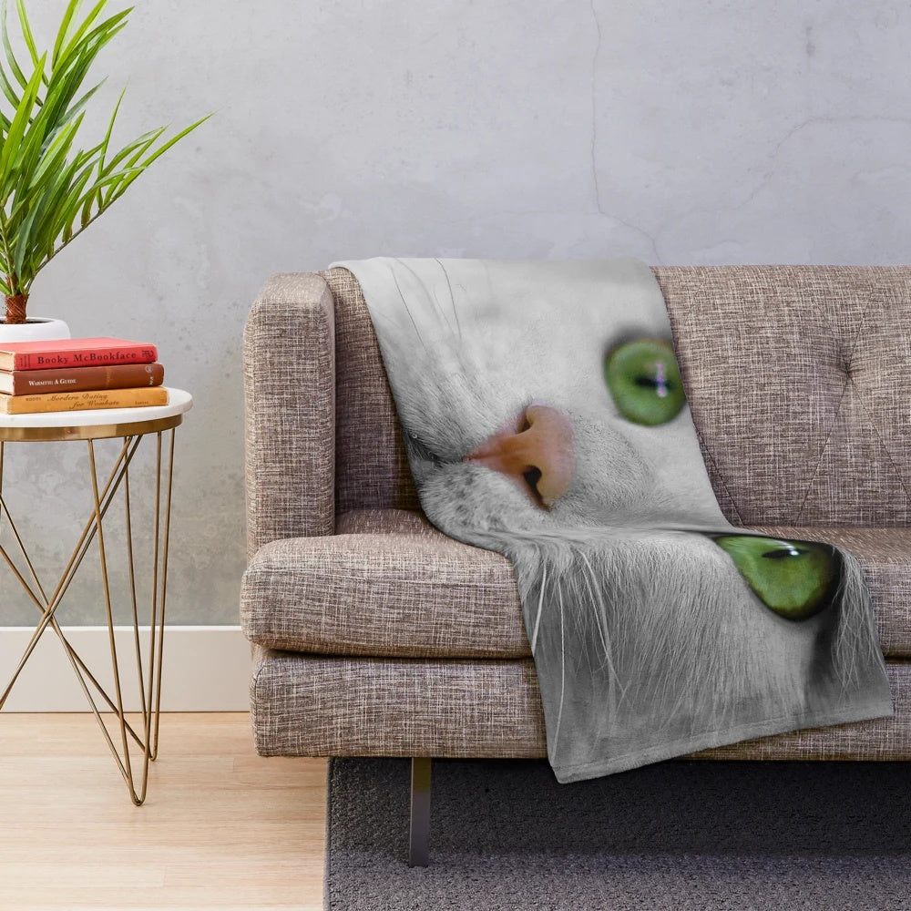 Soft white cat plush blanket with green eyes