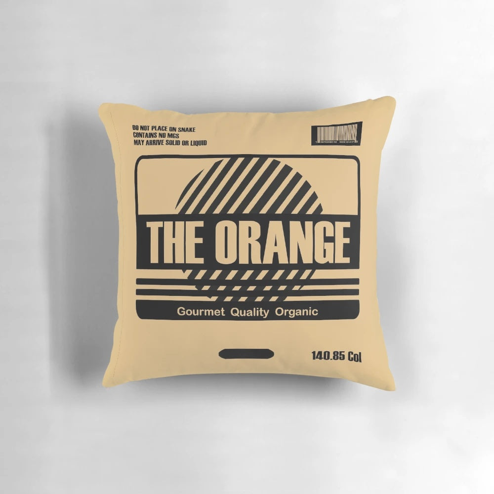 Orange cardboard box pillow with Solid Snake's character from Metal Gear Solid video game series