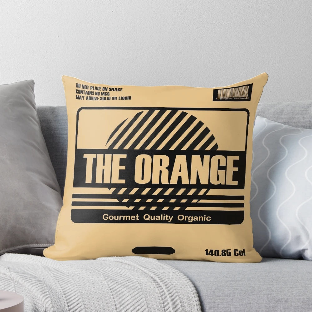 Orange cardboard box pillow with Solid Snake's character from Metal Gear Solid video game series