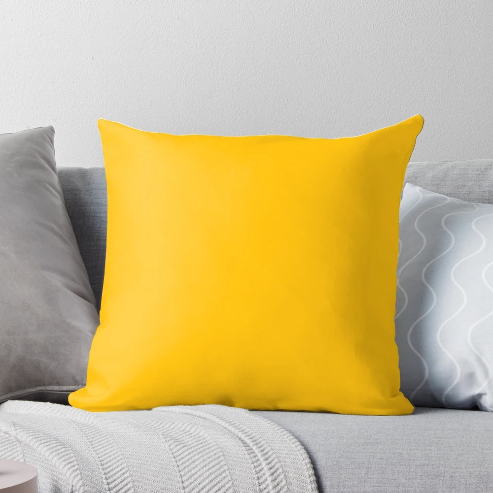 Solid yellow amber colored pillow with a plain, simple design.