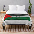 Plush blanket with the Palestinian flag and "Free Palestine" design