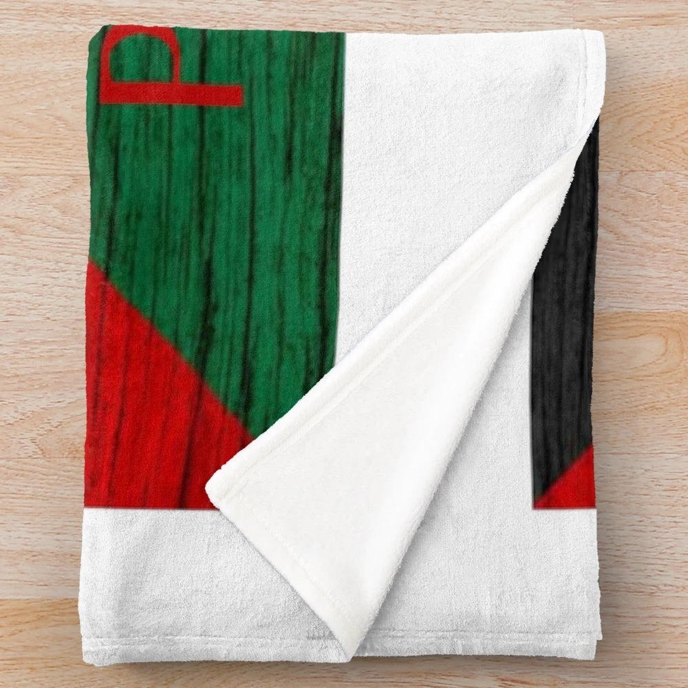 Plush blanket with the Palestinian flag and "Free Palestine" design