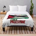 Plush blanket with the Palestinian flag and the words "Free Palestine