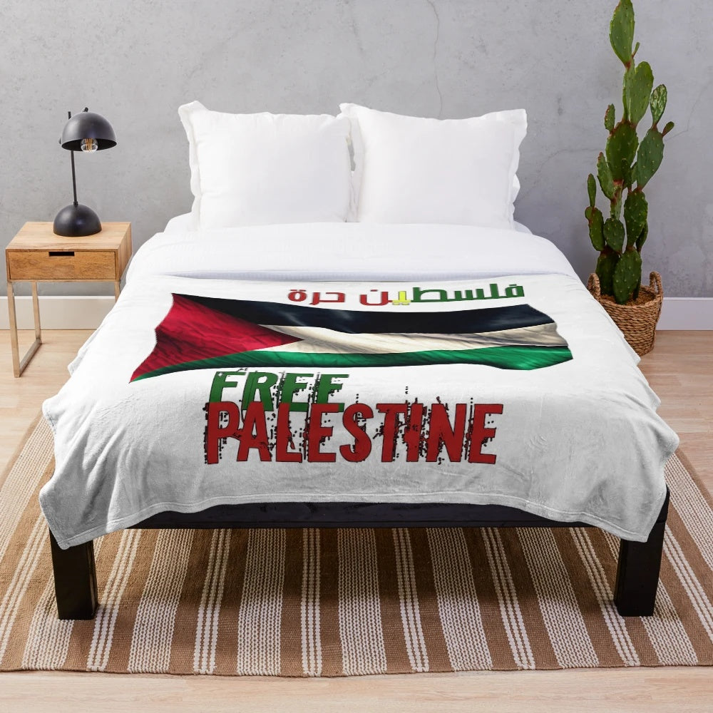 Plush blanket with the Palestinian flag and the words "Free Palestine