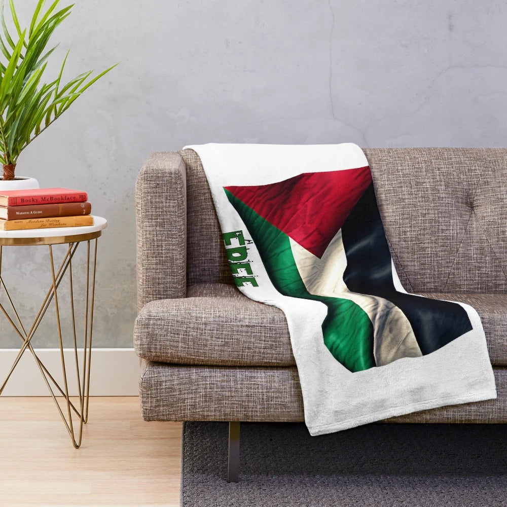 Plush blanket with the Palestinian flag and the words "Free Palestine