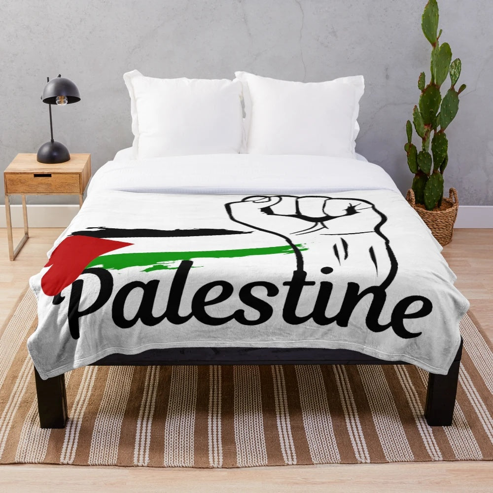 Plush blanket with Palestine flag design, supporting Palestinian freedom and human rights