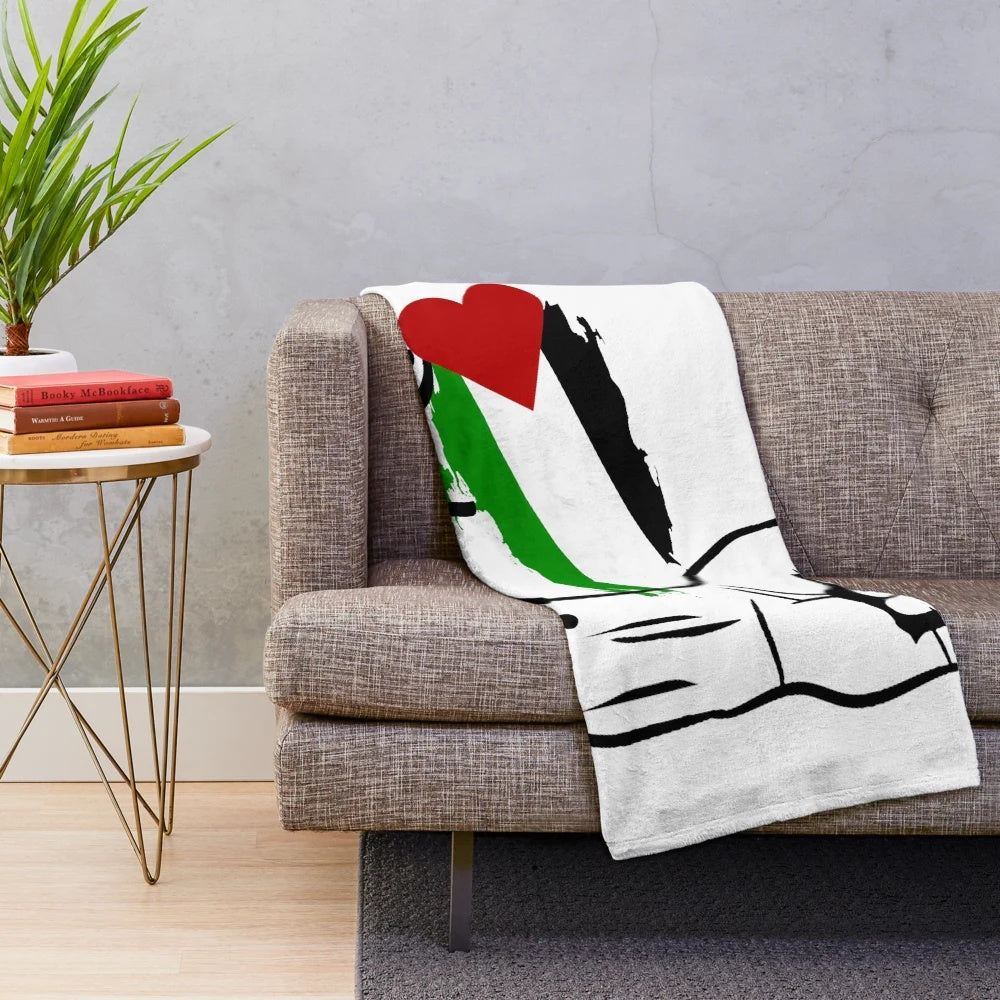 Plush blanket with Palestine flag design, supporting Palestinian freedom and human rights