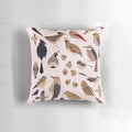 Vibrant illustration of Sonoran desert birds including an owl, quail, cardinal, and cactus wren on a decorative throw pillow