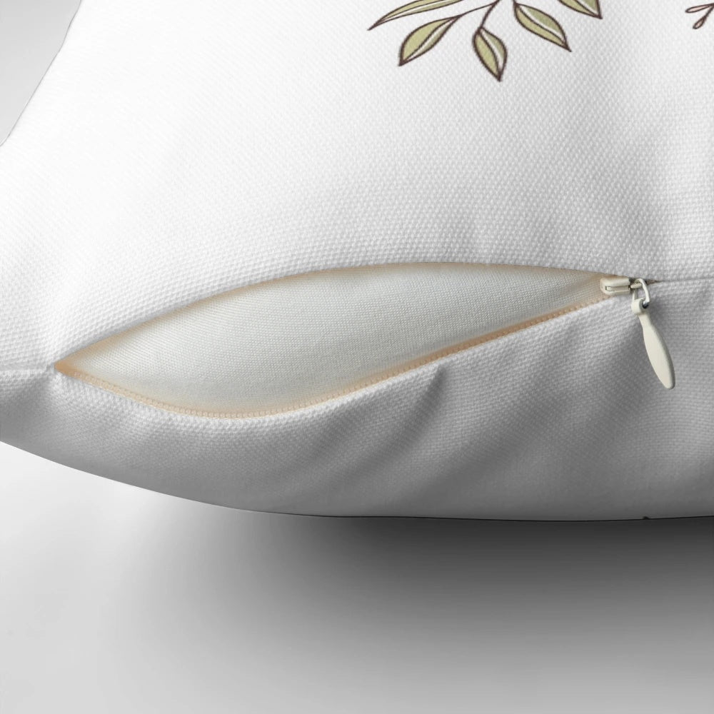 A soft, floral pillow with a motivational quote, perfect for adding a touch of nature and calm to any bedroom.
