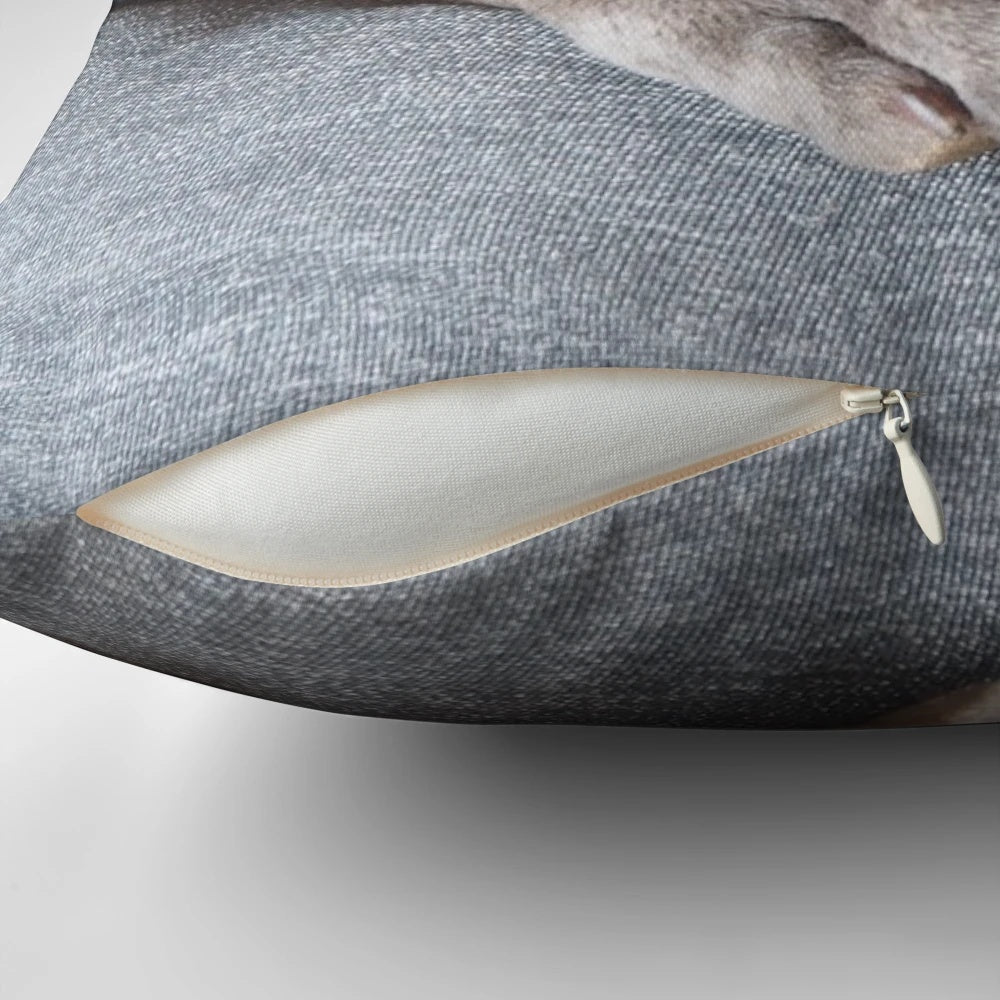 A blue Staffordshire Terrier puppy sleeping peacefully on a pillow, showcasing the adorable and heart-melting design by Vinciedesign.