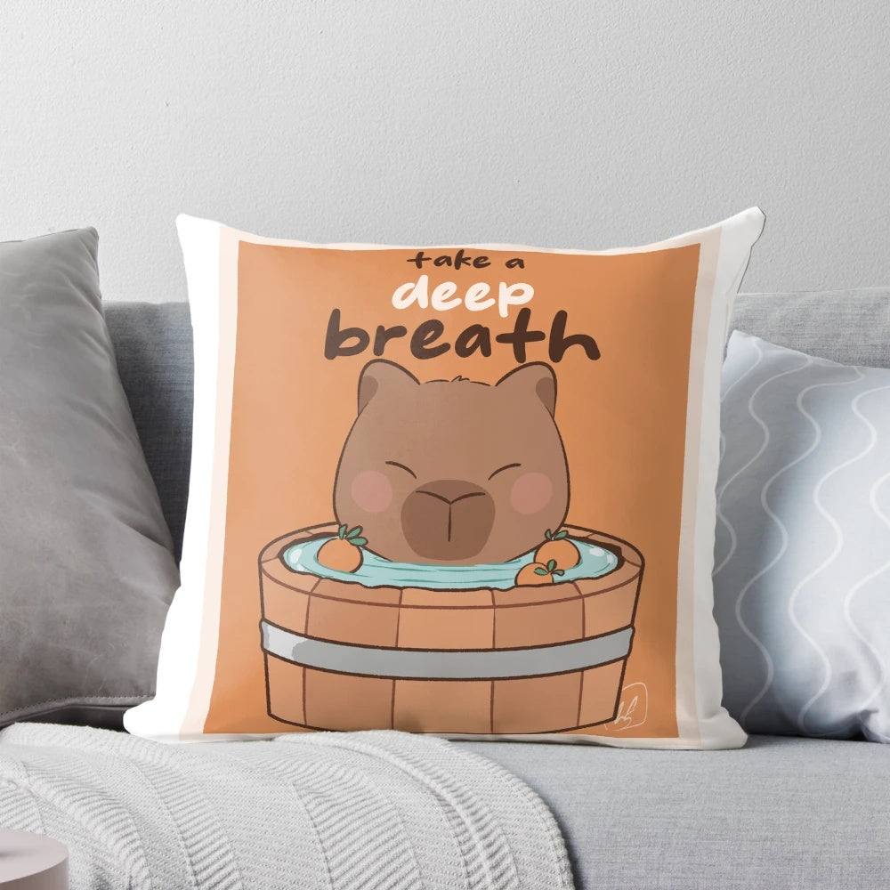 A plush capybara-shaped pillow in an orange color, perfect for practicing deep breathing and promoting mental health.