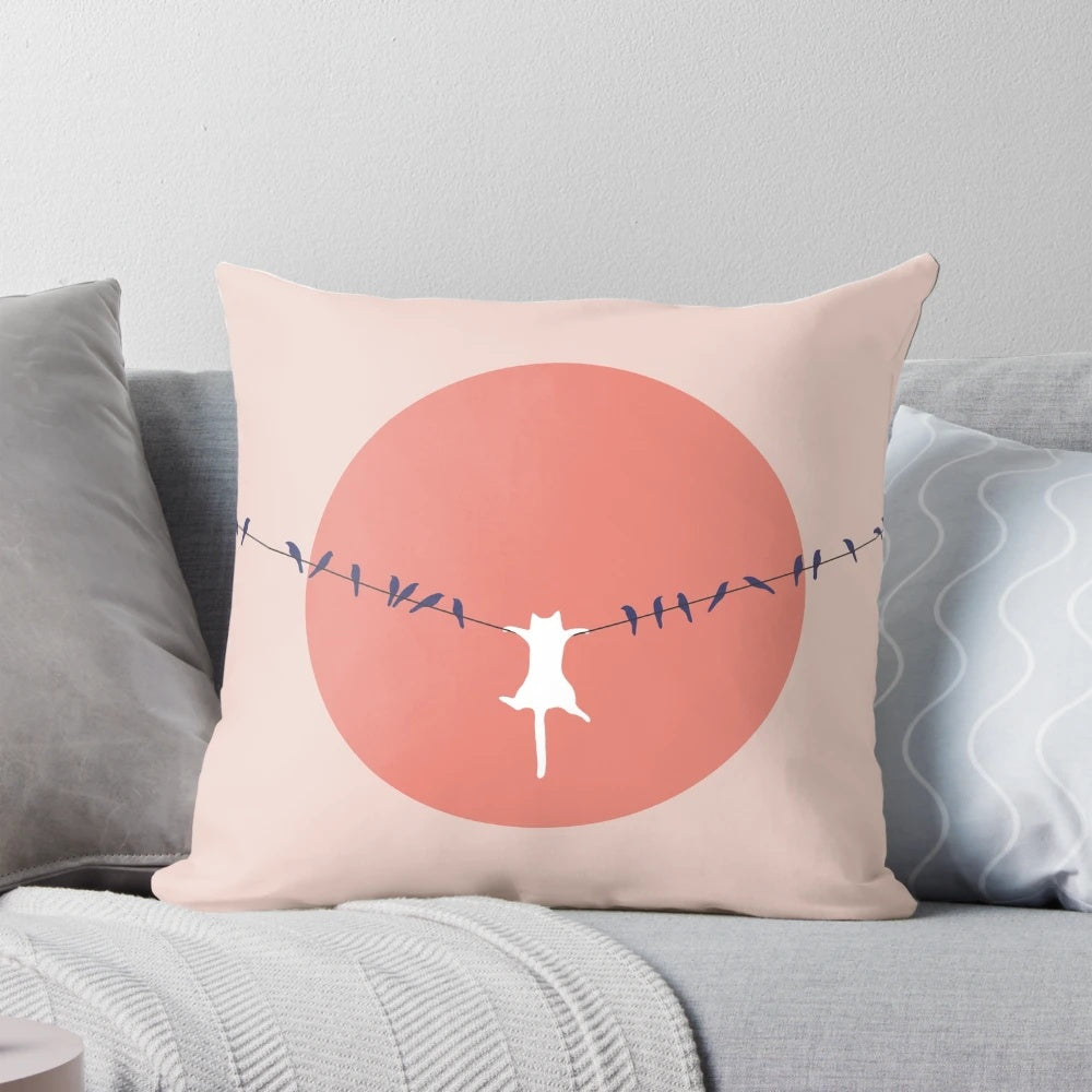 Throw pillow featuring a minimalist cat landscape design with a pink sun and calming colors
