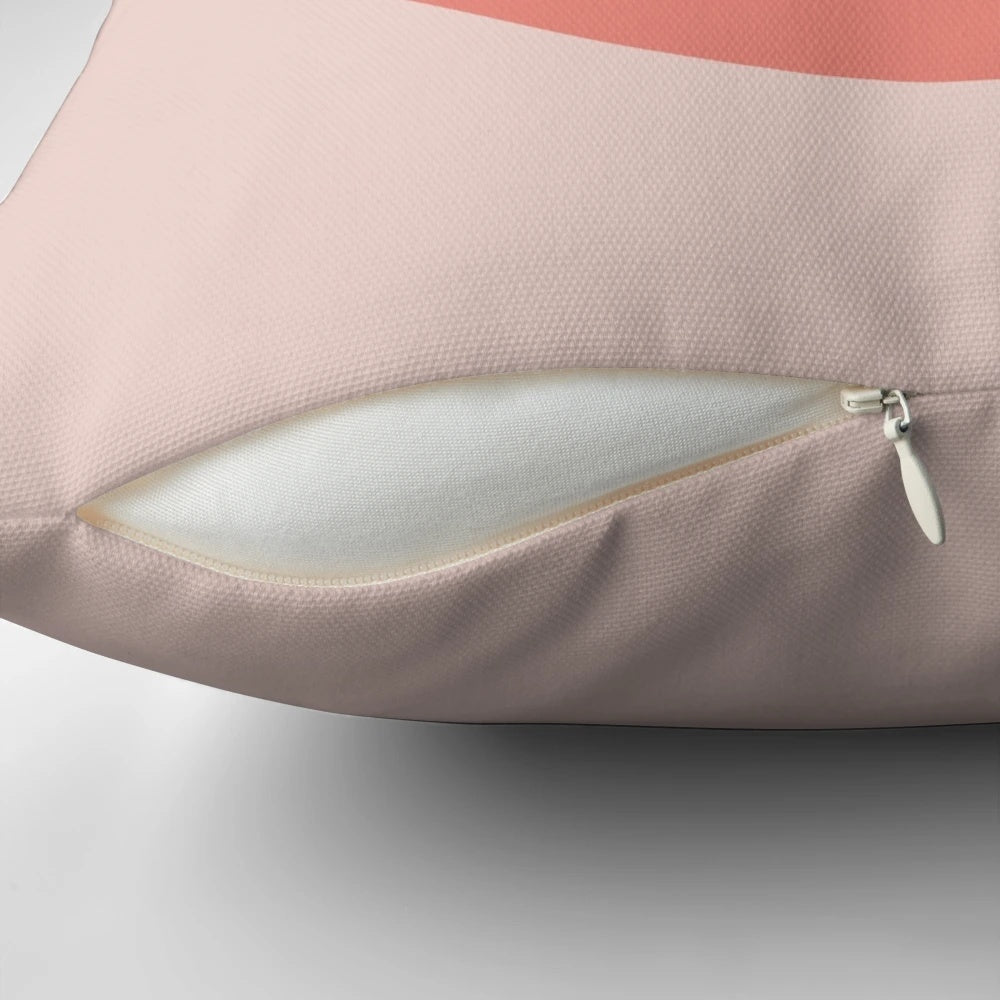 Throw pillow featuring a minimalist cat landscape design with a pink sun and calming colors