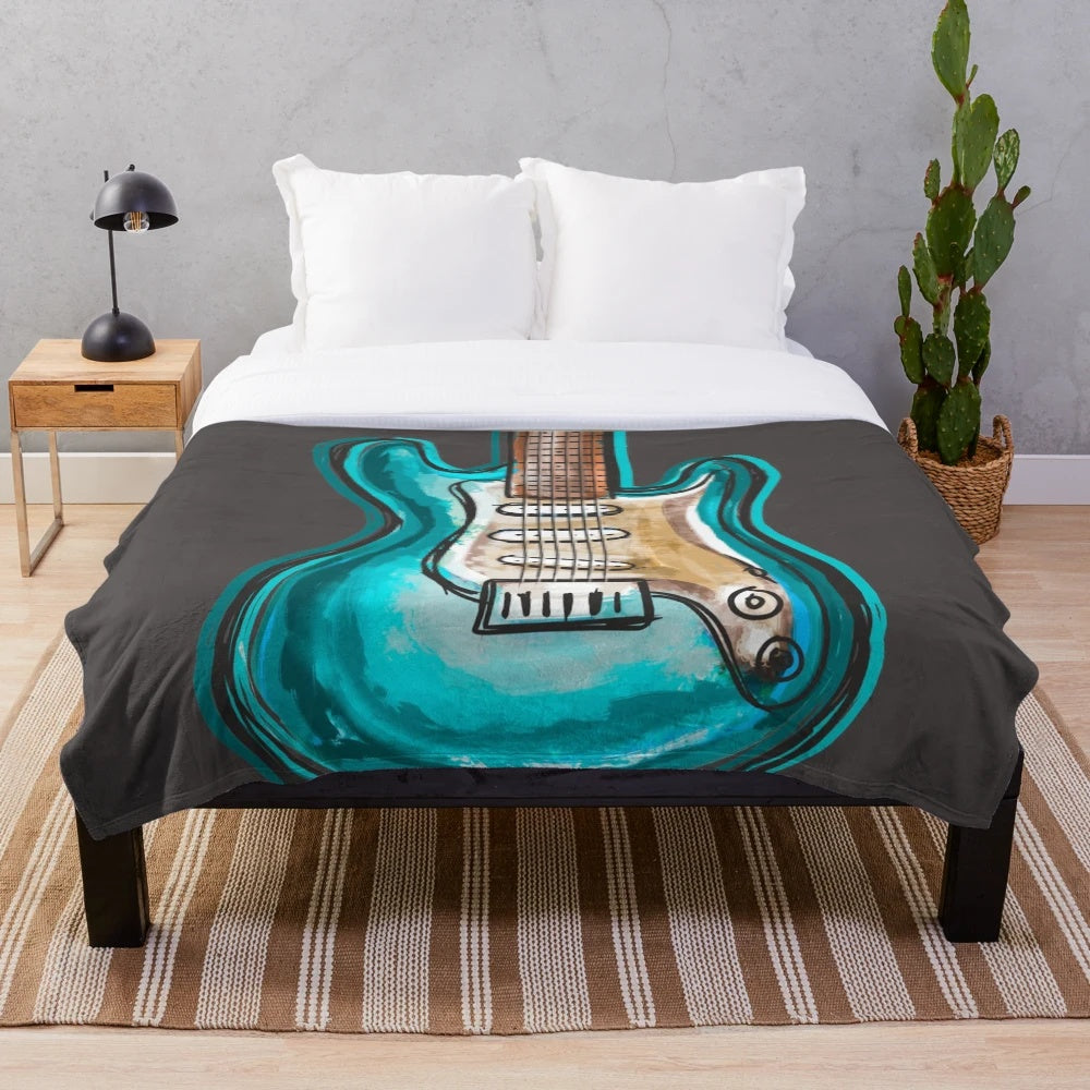 Soft and cozy plush blanket with a guitar music design