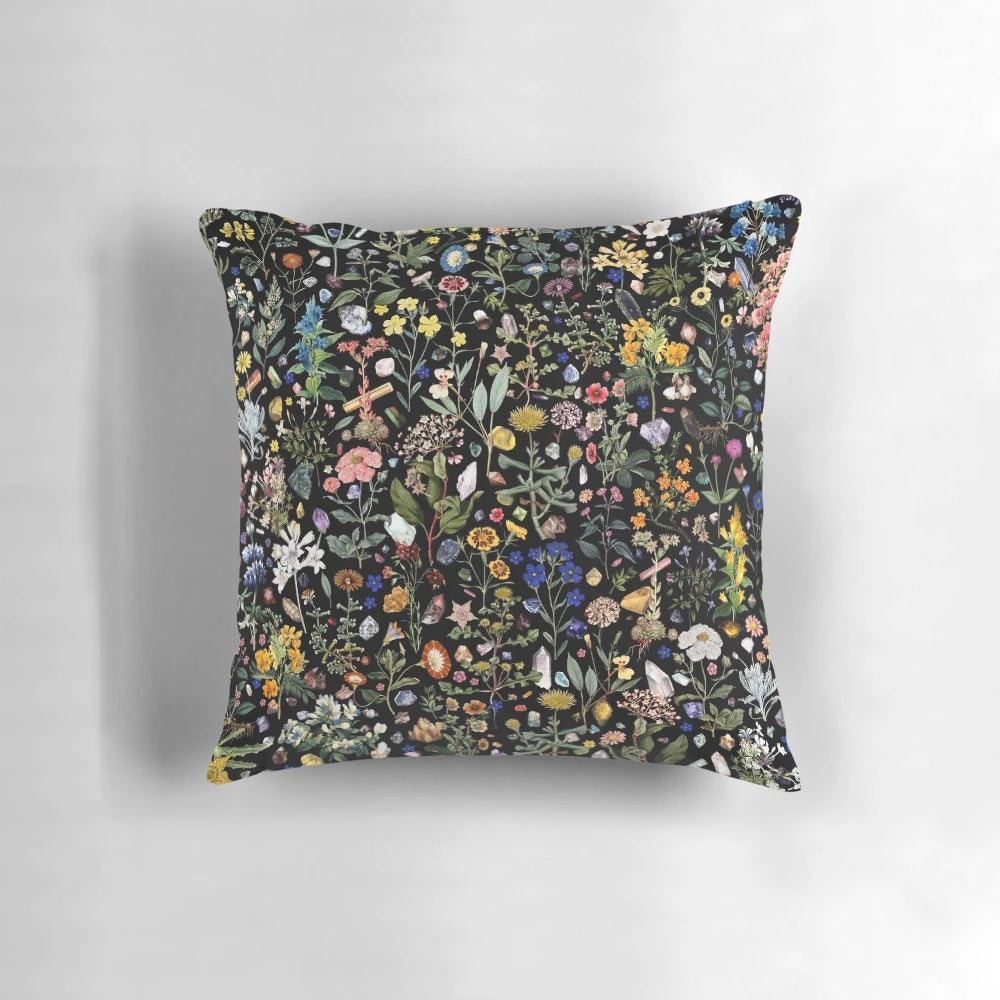 A vibrant, floral-patterned pillow with a healing, botanical design for a peaceful, nature-inspired sleep experience.
