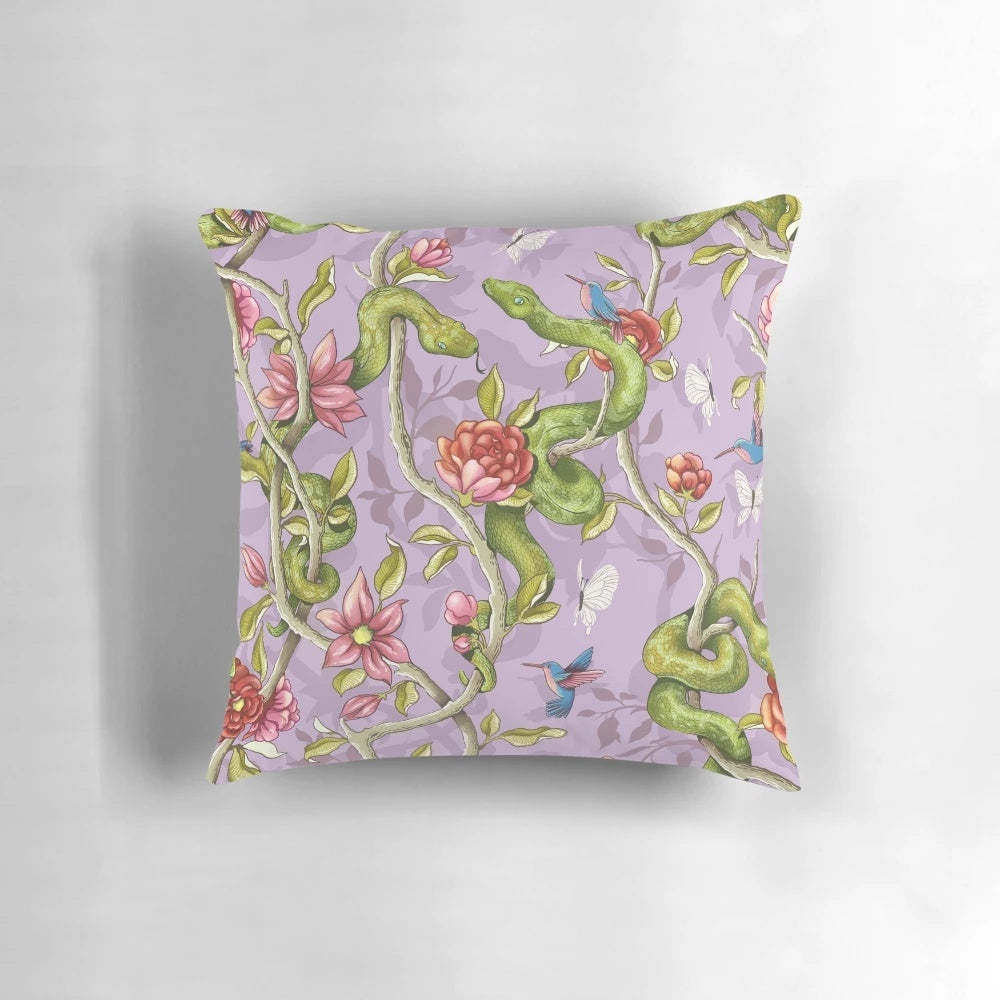 Vibrant lavender and floral design pillow with hummingbirds, butterflies, and peonies