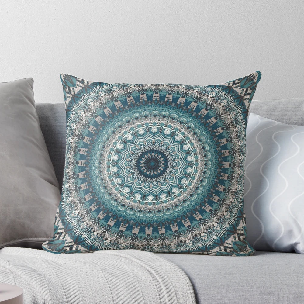 Vibrant mandala-patterned pillow featuring sacred geometry and a flower of life design