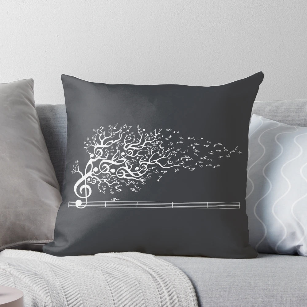 A white pillow with an artistic design featuring nature sounds and musical notes