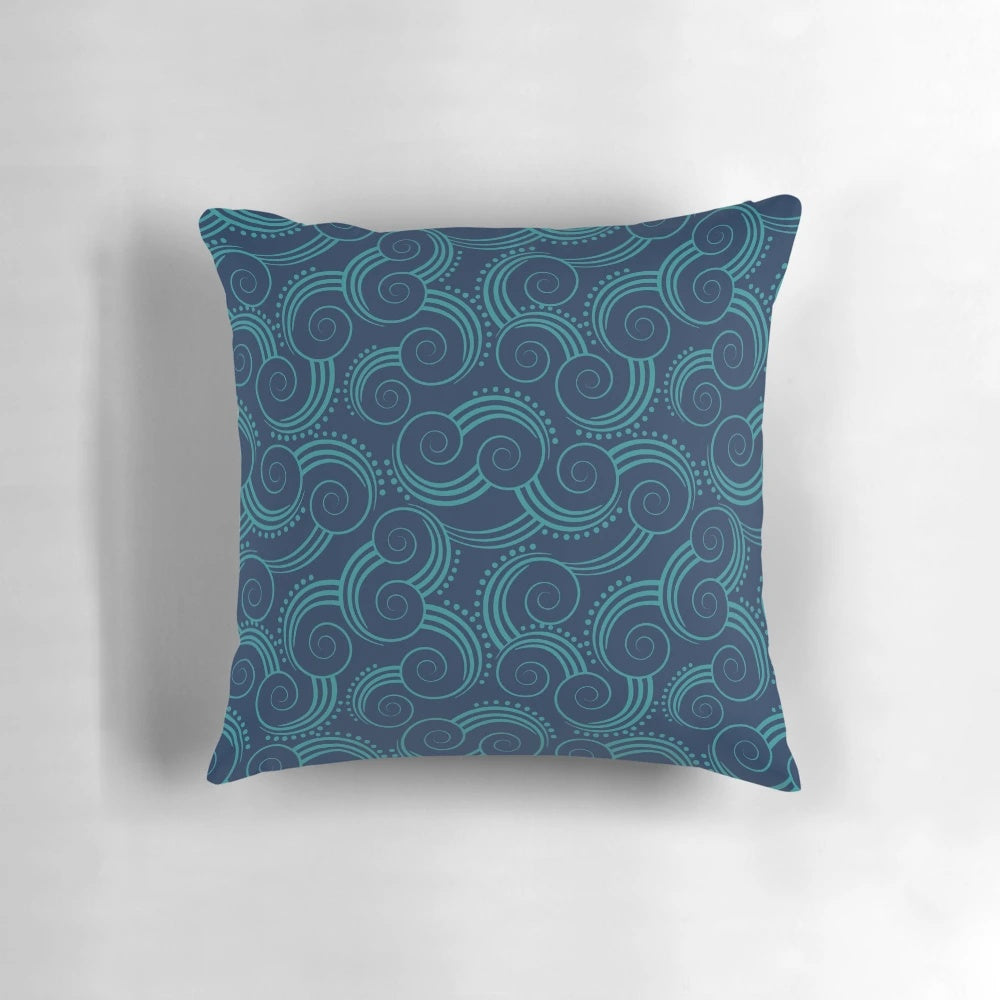 Navy and teal throw pillow with swirly water pattern, perfect for nautical or coastal home decor