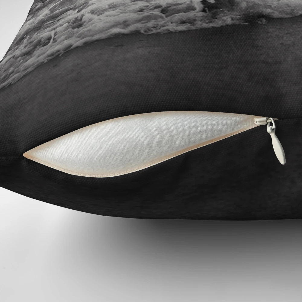 A plush and comfortable pillow featuring a vibrant ocean wave design