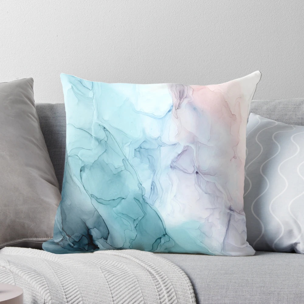 Soft and flowing abstract art pillow in pastel shades of pink and grey