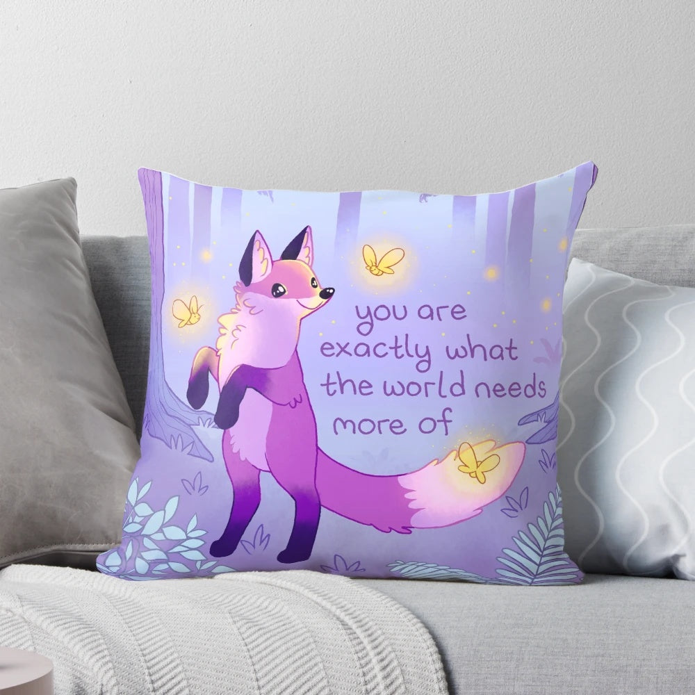 A cozy purple pillow with a design of a kind fox and fireflies dancing in a forest, promoting mental health and self-acceptance.