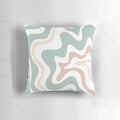 Soothing abstract pillow in light sage celadon green, light blush, and cream colors with a retro, swirling pattern