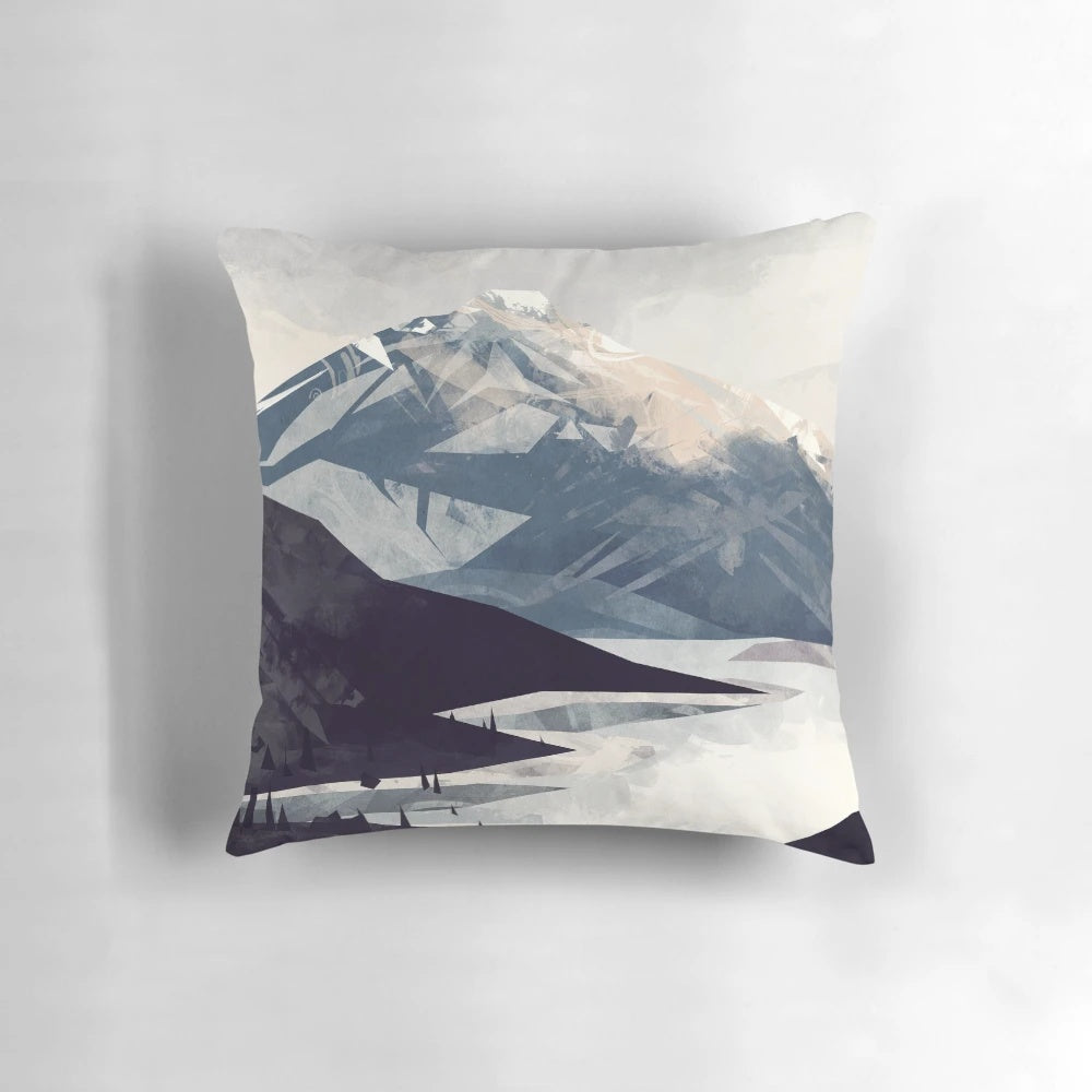 Calming mountain landscape graphic printed on a soft, plush pillow