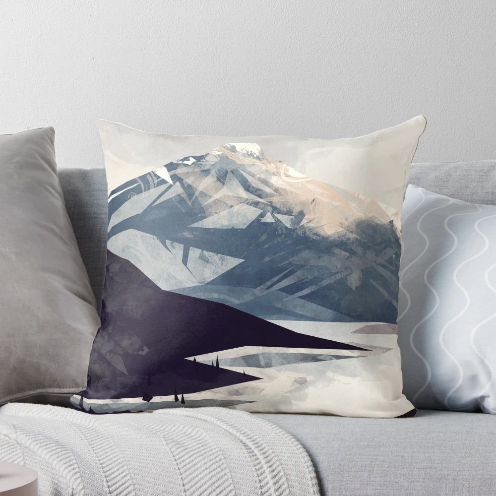Calming mountain landscape graphic printed on a soft, plush pillow