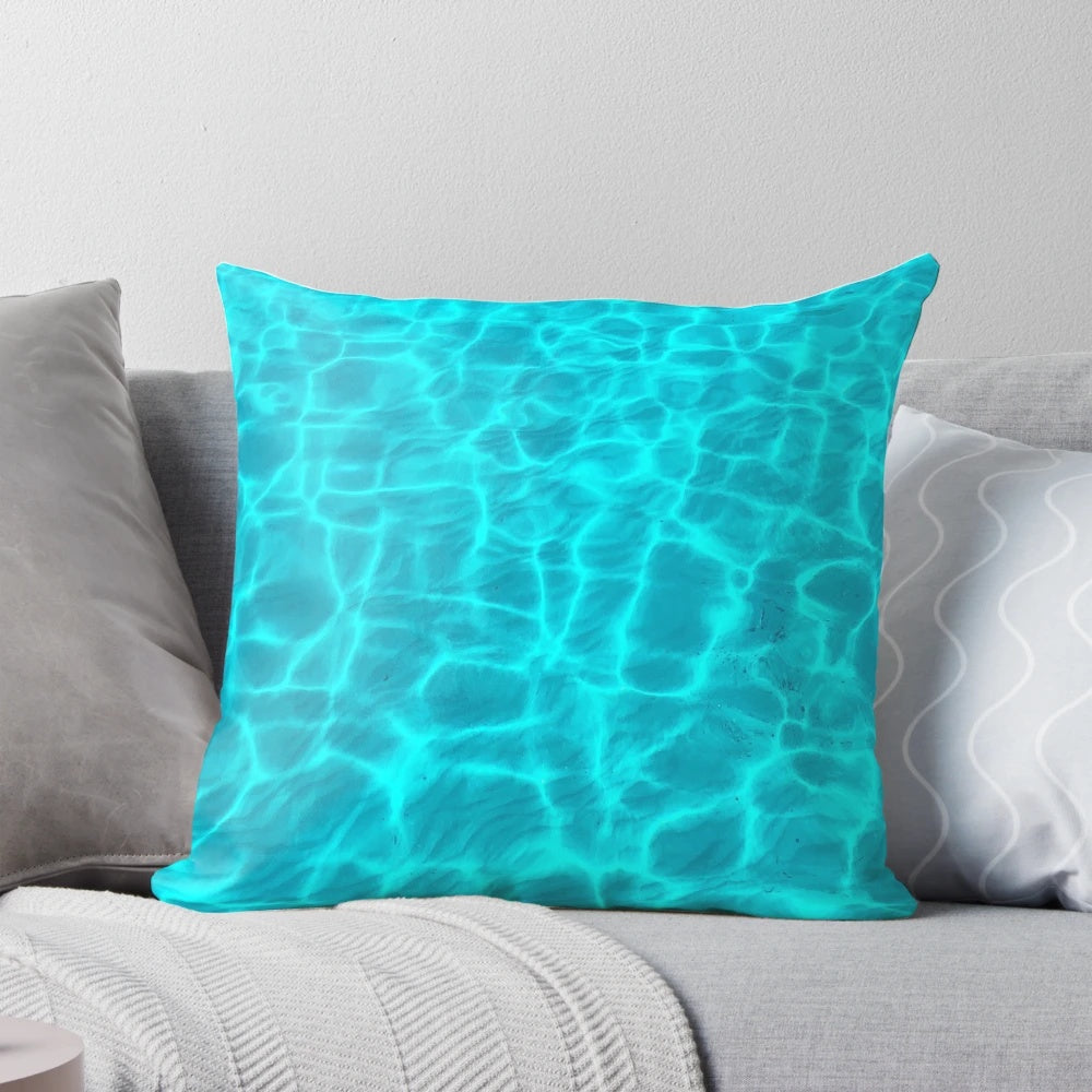 Turquoise blue pillow with ocean waves pattern for calming, beach-inspired home decor