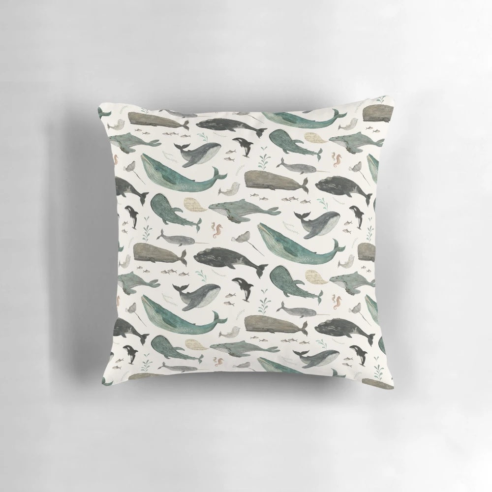 Closeup of a pillow featuring a serene whale song design, perfect for adding a touch of the ocean to any room.