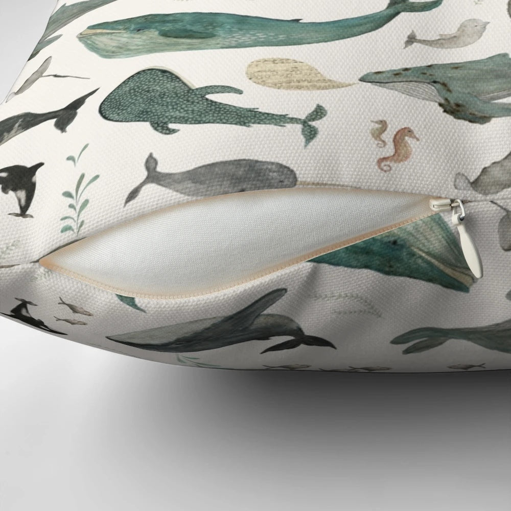 Closeup of a pillow featuring a serene whale song design, perfect for adding a touch of the ocean to any room.