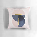 Overlapping circles pillow in pastel pink and navy blue, featuring a minimalist geometric design.
