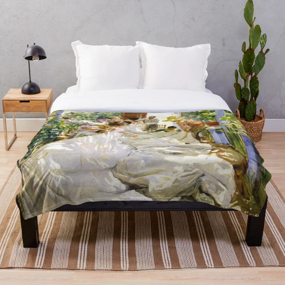 Sorolla's 'Sewing the Sail' 1896 painting on a plush blanket
